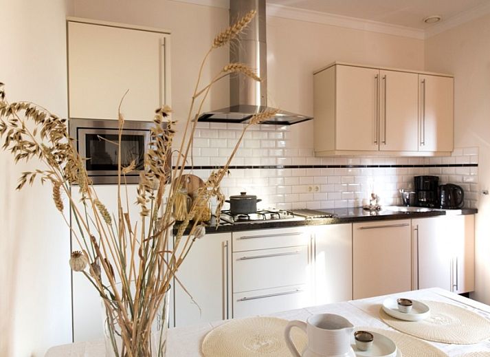 Huize Stevens vacation home in Well, North Limburg, with charming brick facade and rural setting.