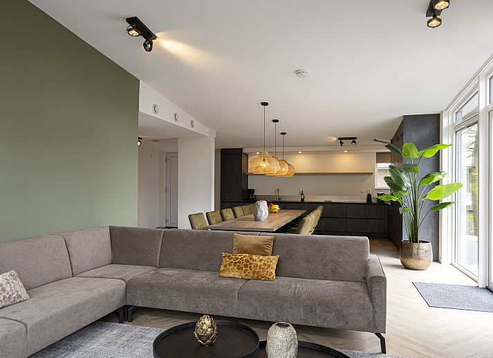 Relax in the luxurious bathroom of the 12-person wellness villa 12ELW in Well, North Limburg.