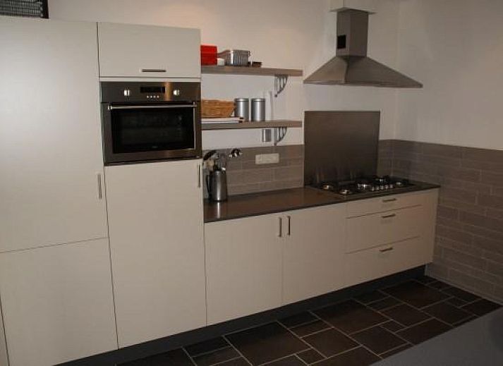 Bedroom in L006 vacation home, Arcen, Limburg with comfortable double bed.