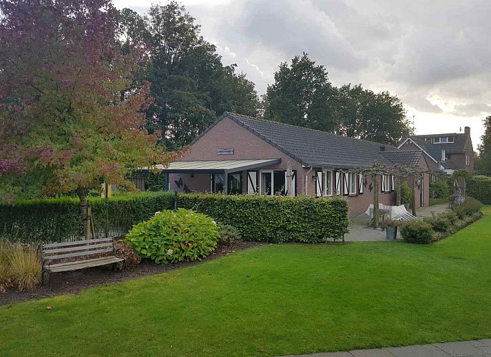 Bedroom in L006 vacation home, Arcen, Limburg with comfortable double bed.