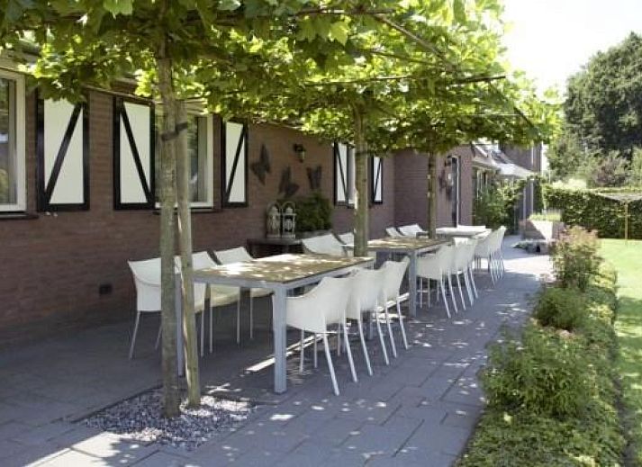Bedroom in L006 vacation home, Arcen, Limburg with comfortable double bed.