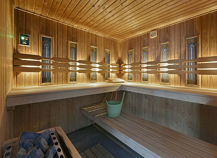 Cozy living room in the Detached house in Arcen, North Limburg. Comfortable vacation home with modern amenities and garden views.