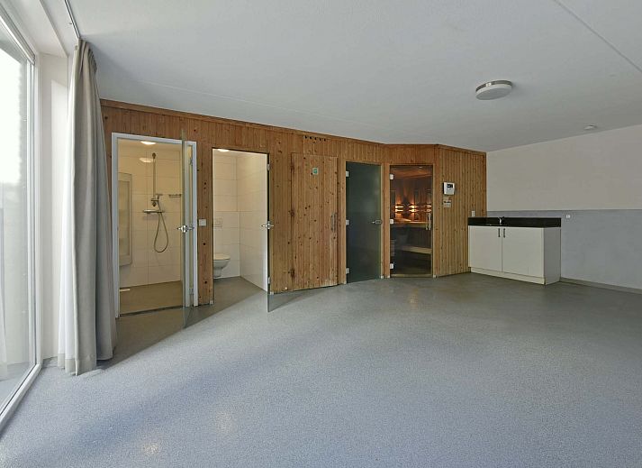 Cozy living room in the Detached house in Arcen, North Limburg. Comfortable vacation home with modern amenities and garden views.