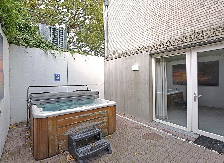 Cozy living room in the Detached house in Arcen, North Limburg. Comfortable vacation home with modern amenities and garden views.