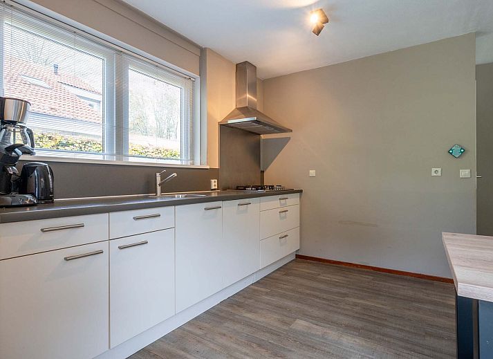 Vrijstaande woning in Arcen, Noord Limburg, biedt een charmant vakantiehuis met ruime binnenruimte en groene omgeving.