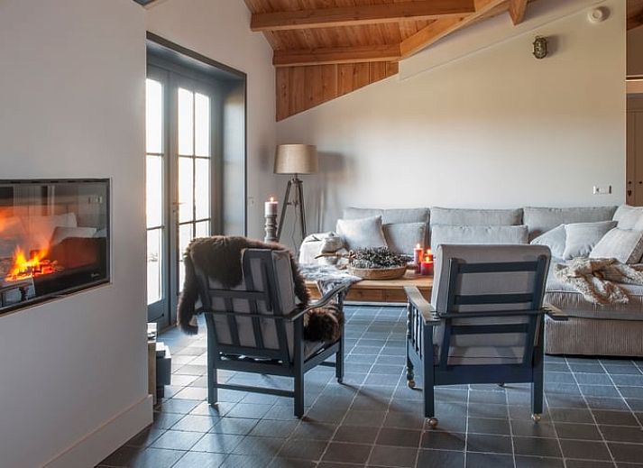 Entrance with flowers at Holiday home in Afferden, North Limburg, surrounded by greenery.