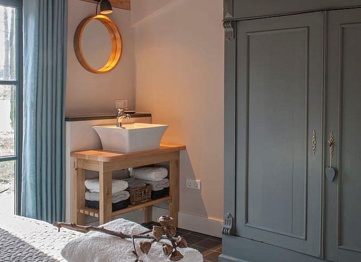 Entrance with flowers at Holiday home in Afferden, North Limburg, surrounded by greenery.