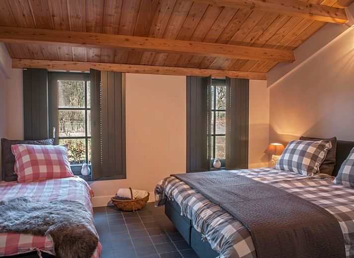 Speelruimte met schommel bij Huisje in Afferden, Noord Limburg, vakantiehuis in groene omgeving.