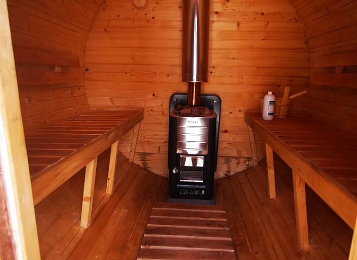 Stylish corner with flowers and plants in Holiday Home in America, North Limburg, for a homey feel.