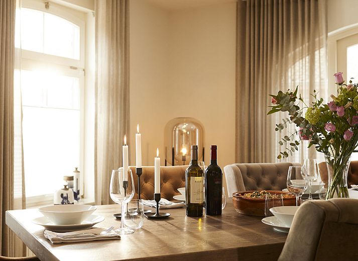 Cozy living room in vacation home L185 in Baarlo, North Limburg with comfortable seating area and modern furnishings.