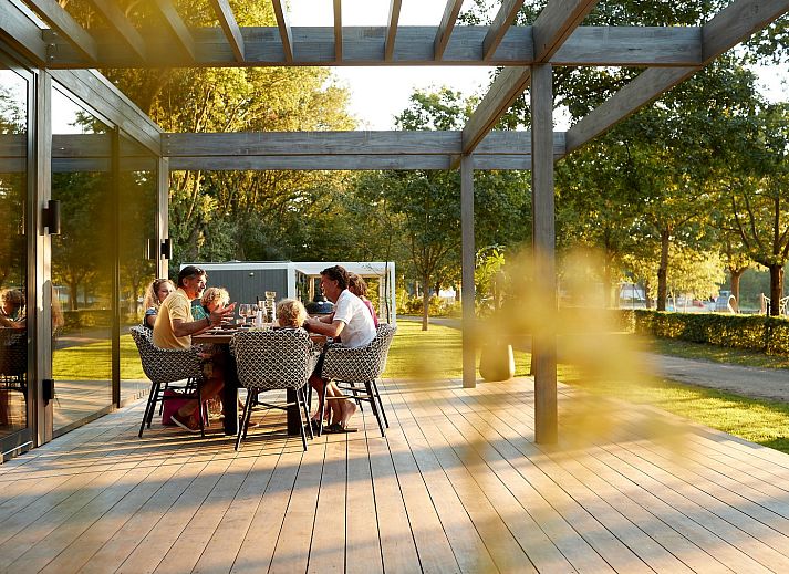 Enjoy the serene nature surrounding Bos Villa, a vacation home for 8 in Maasbree, Limburg, with spacious terrace and modern furnishings.