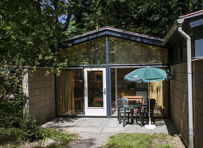 Bright interior of De Lommerbergen 2-bed bungalow in Reuver, North Limburg with comfortable seating area.