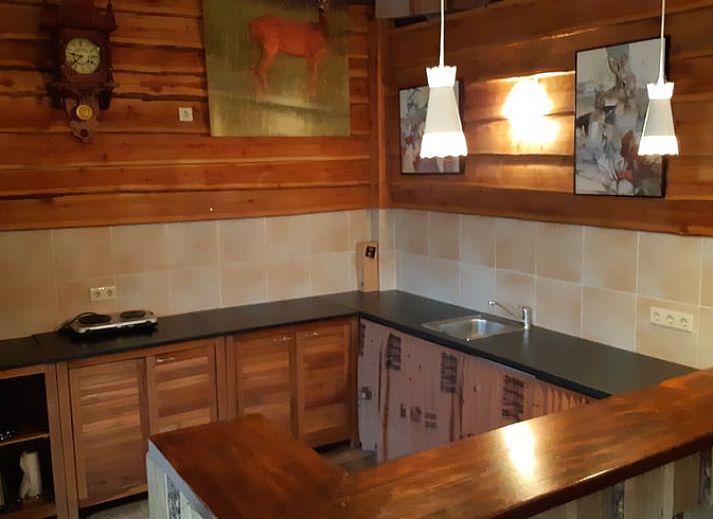 Cottage in Sevenum, North Limburg, overlooking green surroundings and pond.