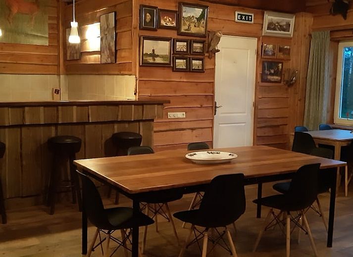 Cottage in Sevenum, North Limburg, overlooking green surroundings and pond.
