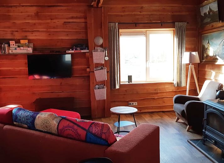 Cottage in Sevenum, North Limburg, overlooking green surroundings and pond.