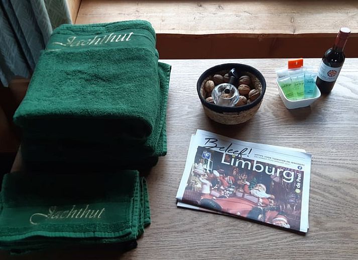Dining Room in Holiday Home in Sevenum, North Limburg, with wooden table and bar.