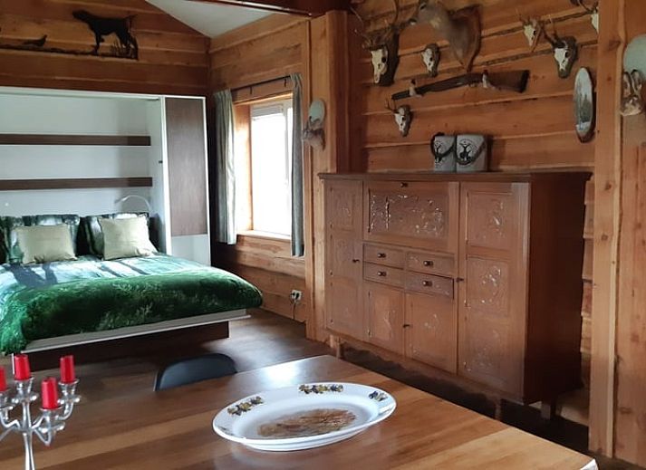 Living room in Holiday Home in Sevenum, North Limburg, with comfortable seating.