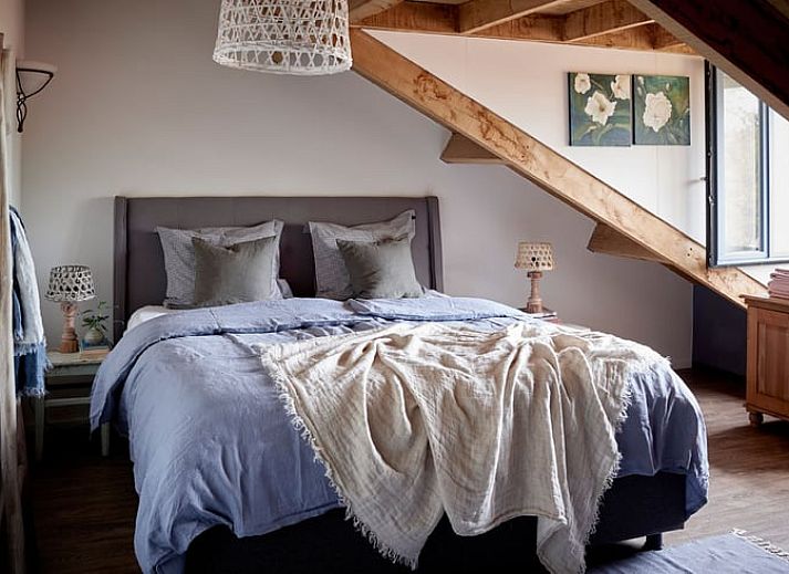 Ontspan op de veranda van Vakantiehuisje in Sevenum, gelegen in het schilderachtige Noord Limburg.