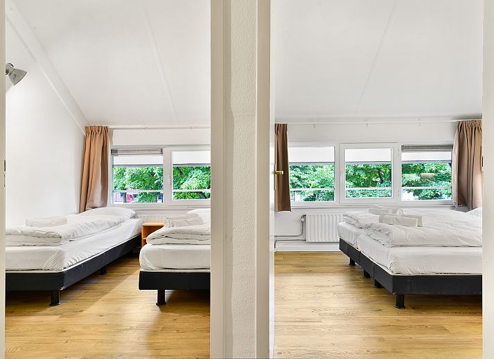 Stijlvolle zithoek in Domein De Schatberg vakantiehuis, Sevenum, Noord Limburg, met moderne meubels en decoratie.