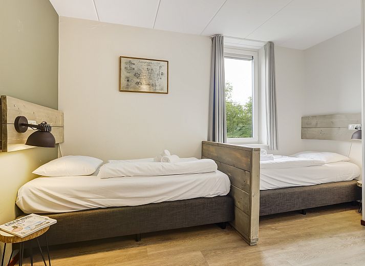 Gezellige zithoek met trap in vakantiehuis, Domein De Schatberg, Sevenum.