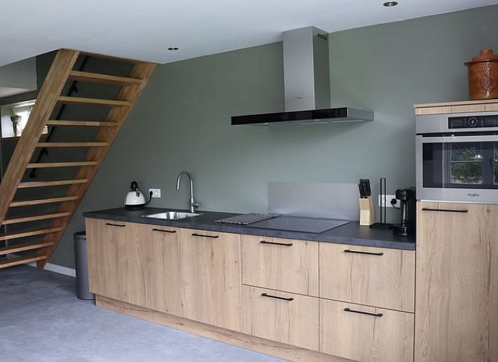 Essecke und Kueche im Ferienhaus in Baexem, Nord-Limburg fuer gemuetliche Mahlzeiten.