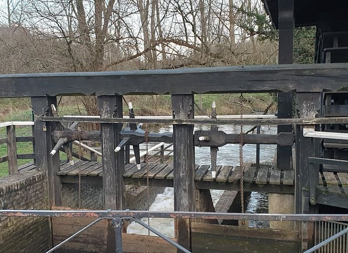Cozy terrace at Holiday home in Heythuysen, North Limburg, with comfortable chairs and nature surrounding the vacation home.