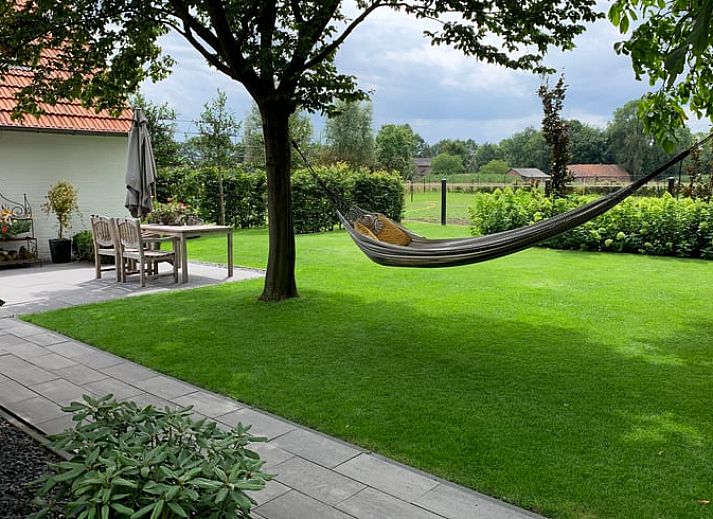 Vakantiehuisje in Heythuysen met groene tuin en terras, Noord Limburg, Limburg.