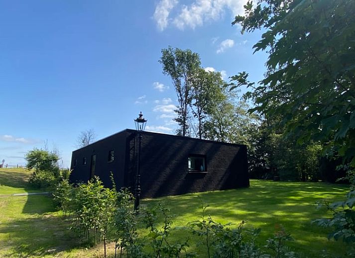 Cottage in Wanssum, vacation home in North Limburg surrounded by greenery and nature.