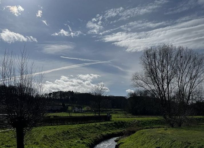 Spacious bedroom in Bed and Breakfast Ellen Maastricht, South Limburg, with modern interior and lots of natural light.