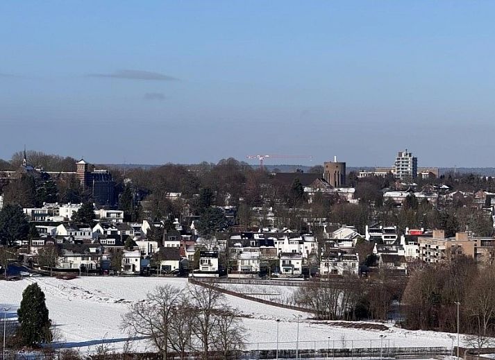 Spacious bedroom in Bed and Breakfast Ellen Maastricht, South Limburg, with modern interior and lots of natural light.