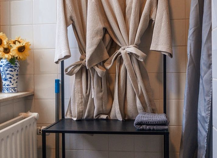 Cozy living room in Holiday home in Maastricht, South Limburg, overlooking the green surroundings.