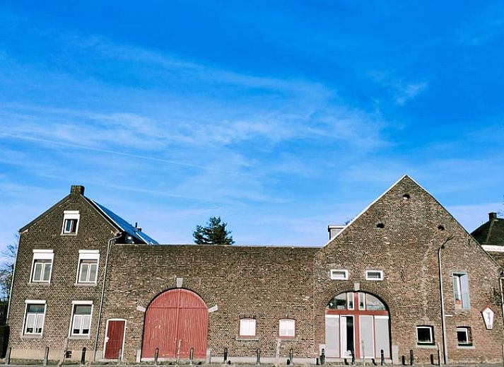 Cozy living room in Holiday home in Maastricht, South Limburg, overlooking the green surroundings.