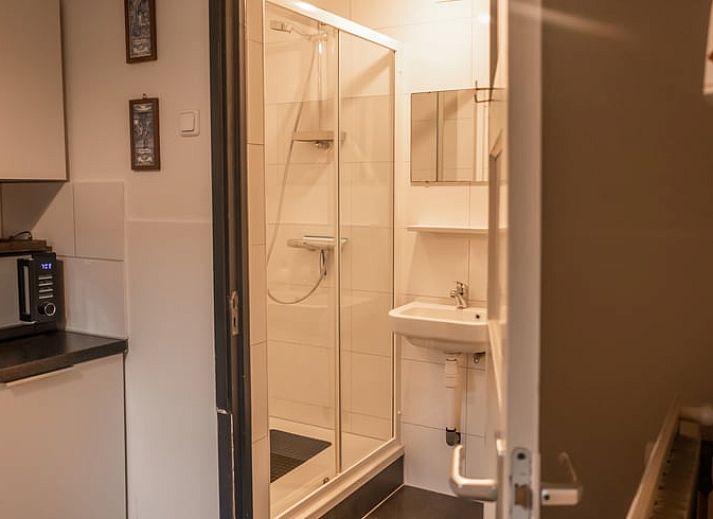 Fresh flowers on the table at Holiday Home in Maastricht, South Limburg, ideal for a relaxing stay.