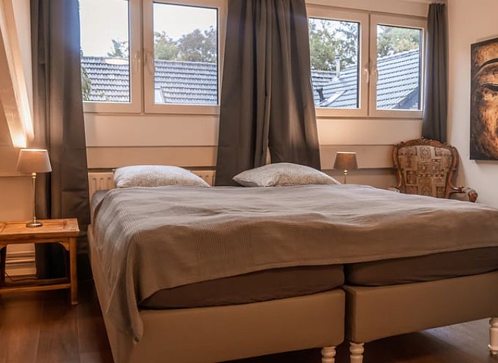 Fresh flowers on the table at Holiday Home in Maastricht, South Limburg, ideal for a relaxing stay.