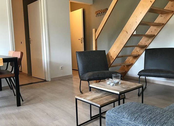 Uitzicht op groene tuin bij Vakantiehuisje in Heijenrath, Zuid Limburg, ideaal voor ontspanning en natuurbeleving.