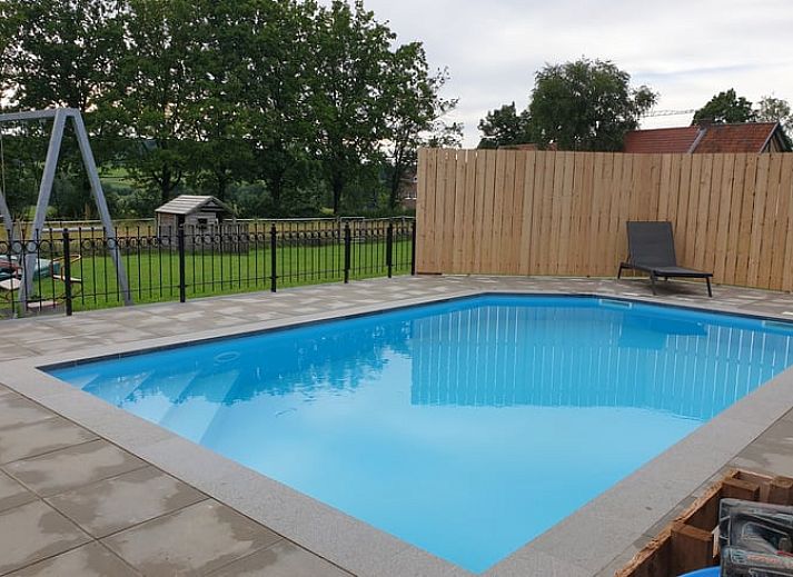 Moderne keuken in Vakantiehuis in Mechelen, Zuid Limburg met uitzicht op de natuur, perfect voor een ontspannen verblijf in Limburg.