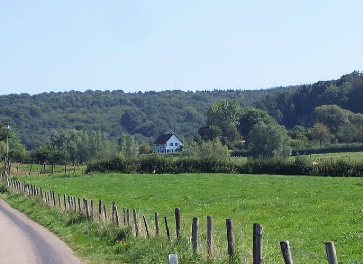Outdoor area of Holiday Home in Mechelen, South Limburg, with terrace and green garden.