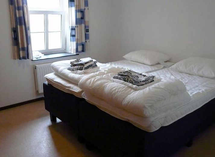 Gezellige eetkamer in Vakantiehuis in Mechelen, Zuid Limburg, met moderne keuken.