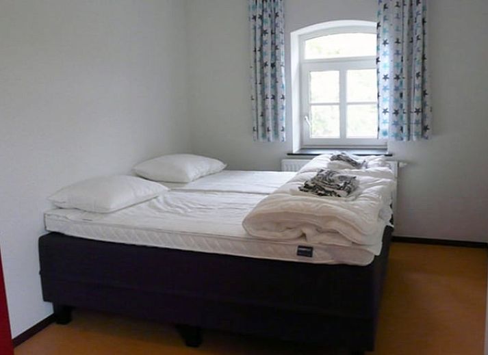 Gezellige eetkamer in Vakantiehuis in Mechelen, Zuid Limburg, met moderne keuken.