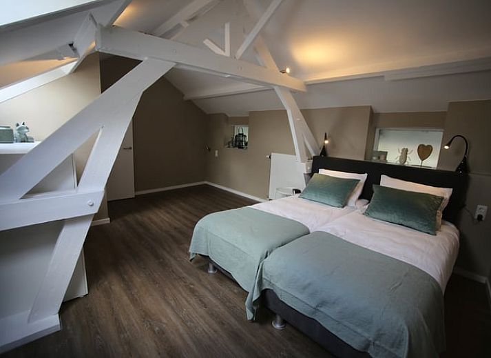 Relax on the terrace of Cottage in Schin op Geul with stunning views of South Limburg.