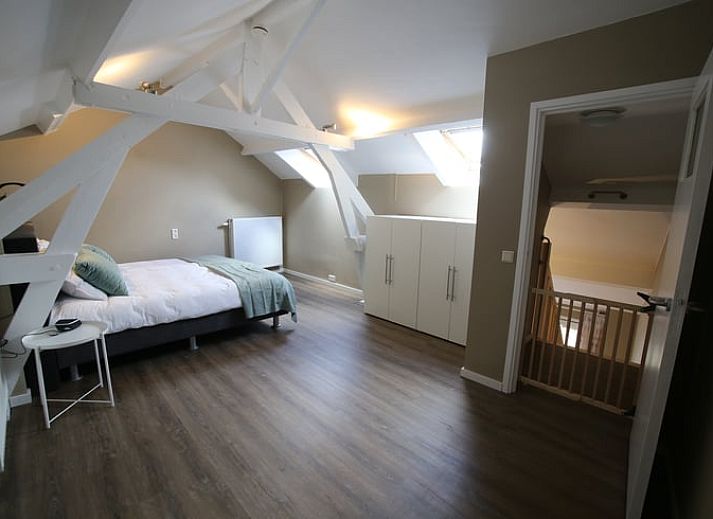 Relax on the terrace of Cottage in Schin op Geul with stunning views of South Limburg.