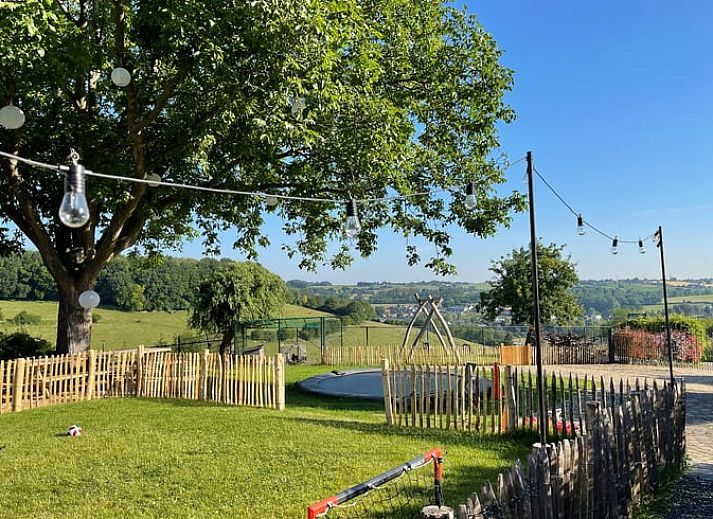 Cozy outdoor dining at Huisje in Schin op Geul, a vacation home in South Limburg.