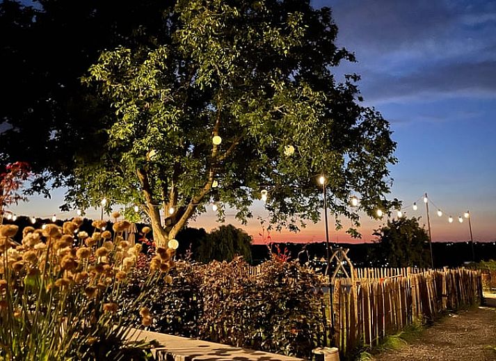 Cozy outdoor dining at Huisje in Schin op Geul, a vacation home in South Limburg.