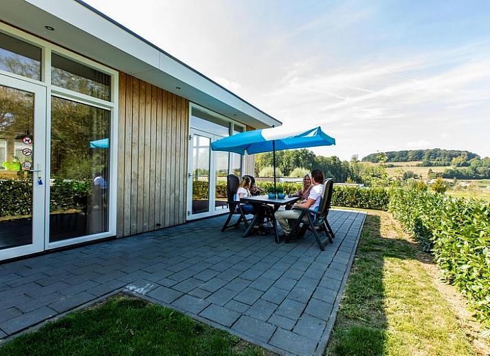 Enjoy the terrace at Module 6 persons vacation home in Schin op Geul, South Limburg with beautiful views of the hills.