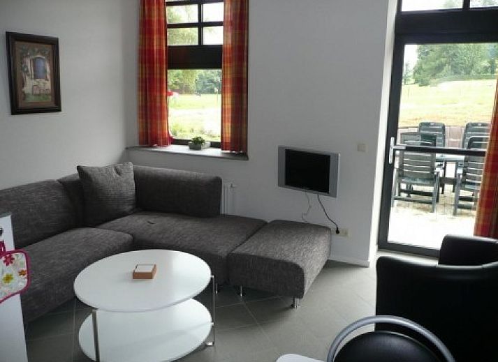 Entrance of Landgoed Karsveld vacation home in Slenaken, South Limburg with charming rural architecture.