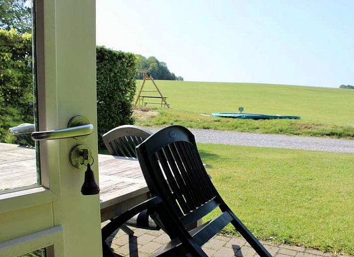 Uitzicht op groene velden bij Vakantiehuisje in Gulpen, Zuid Limburg, een charmant vakantiehuis in de natuur van Limburg.