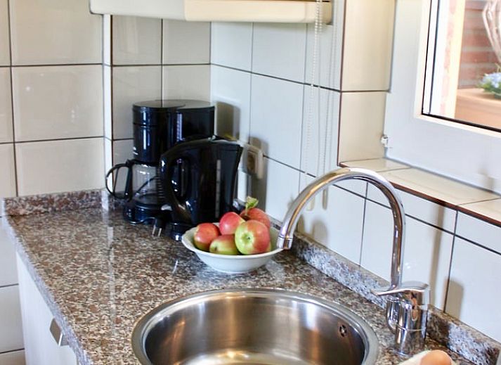 Geniet van de rustieke charme van Vakantiehuisje in Gulpen, Zuid Limburg, met uitzicht op de groene omgeving en traditionele architectuur.