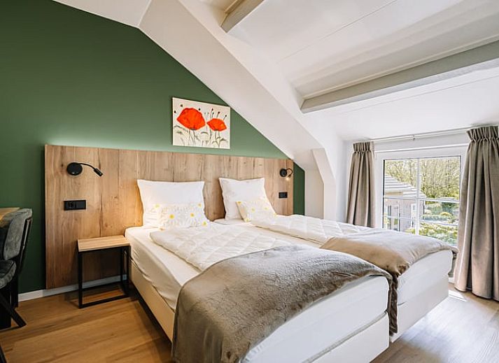 Buitenzitje Vakantiehuis in Gulpen, Zuid Limburg, omringd door natuur en rust.