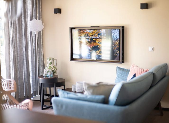 Enjoy peace and quiet on the terrace of Hillside Comfort 4, a vacation home in Gulpen, South Limburg, surrounded by lush nature.