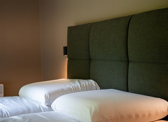 Gezellige woonkamer van vakantiehuis The Pie 8 in Gulpen, Zuid Limburg, met moderne inrichting en veel natuurlijk licht.